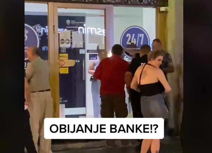 (ВИДЕО) Полицајци и граѓани обиваат банка среде Белград, заборавиле жена внатре
