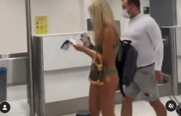 (ВИДЕО) Барем носи маска: Девојка во бикини се прошета на аеродром